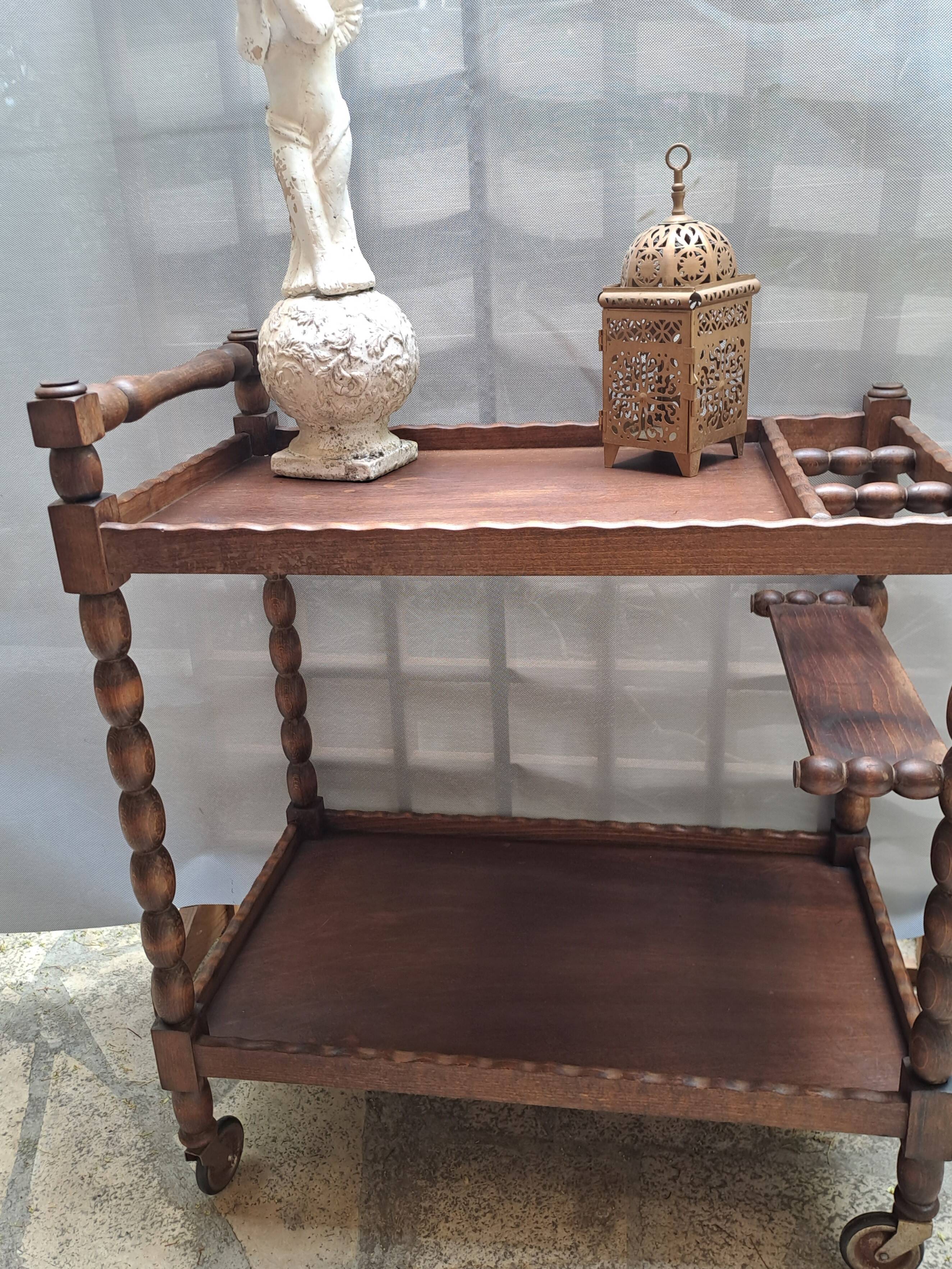Dessert, table with wheels, side table in solid wood stained brown color France 1960