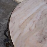 Round coffee table in wrought iron and on marble