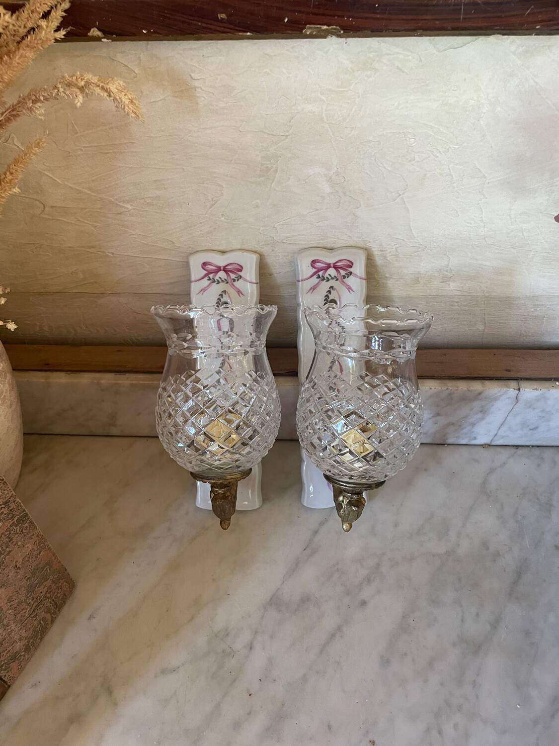 Pair of cut glass and Limoges porcelain wall sconces