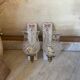Pair of cut glass and Limoges porcelain wall sconces