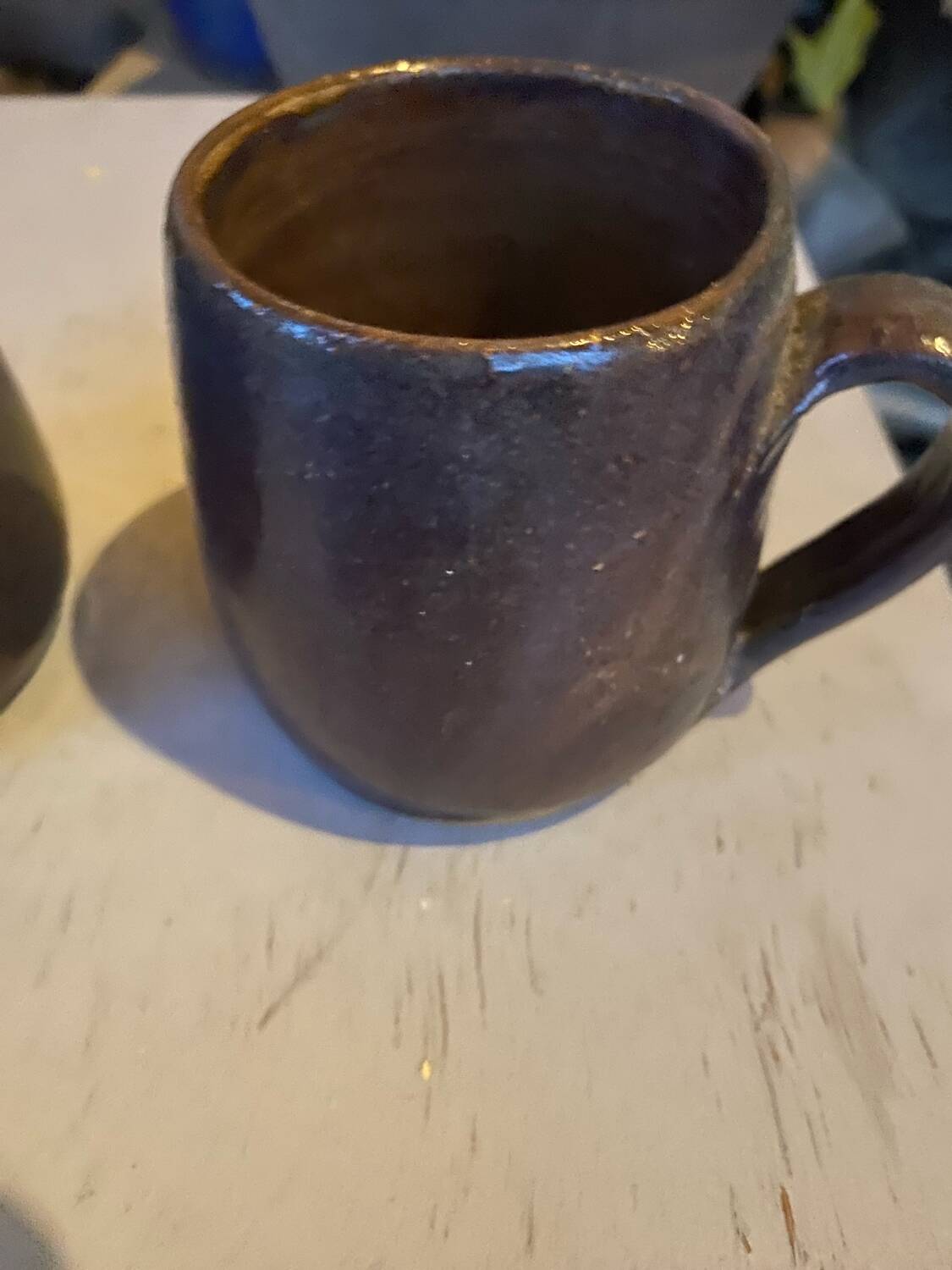 Sets of signed glazed stoneware mugs
