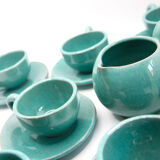 Set of 6 cups in turquoise blue enamelled earth with their saucers and milk jar