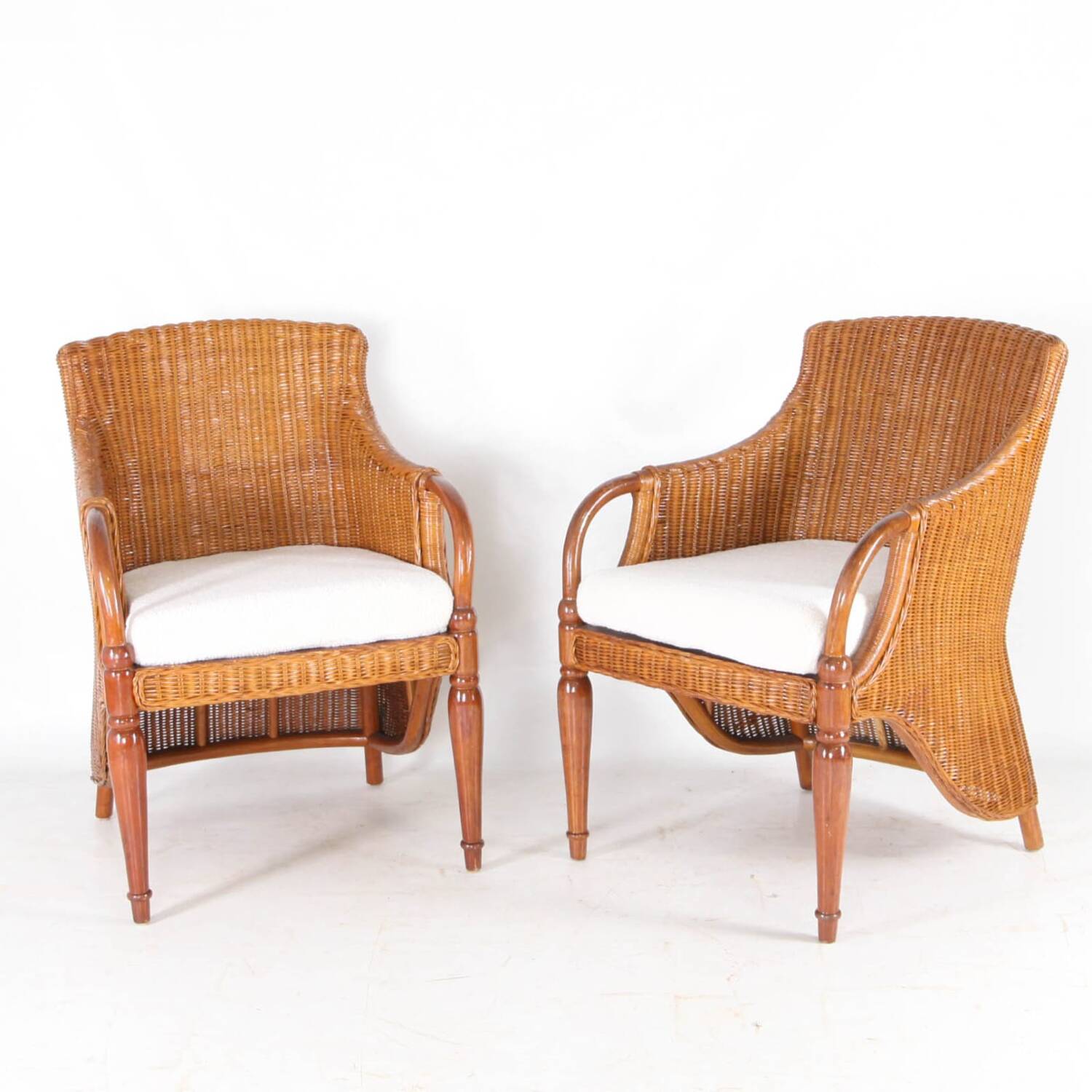 Pair of wooden and wicker armchairs