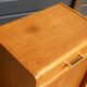 Furniture with 1 door and 1 drawer in light oak.