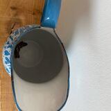 Blue and white speckled enameled pitcher