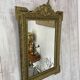 Antique mirror with a pediment