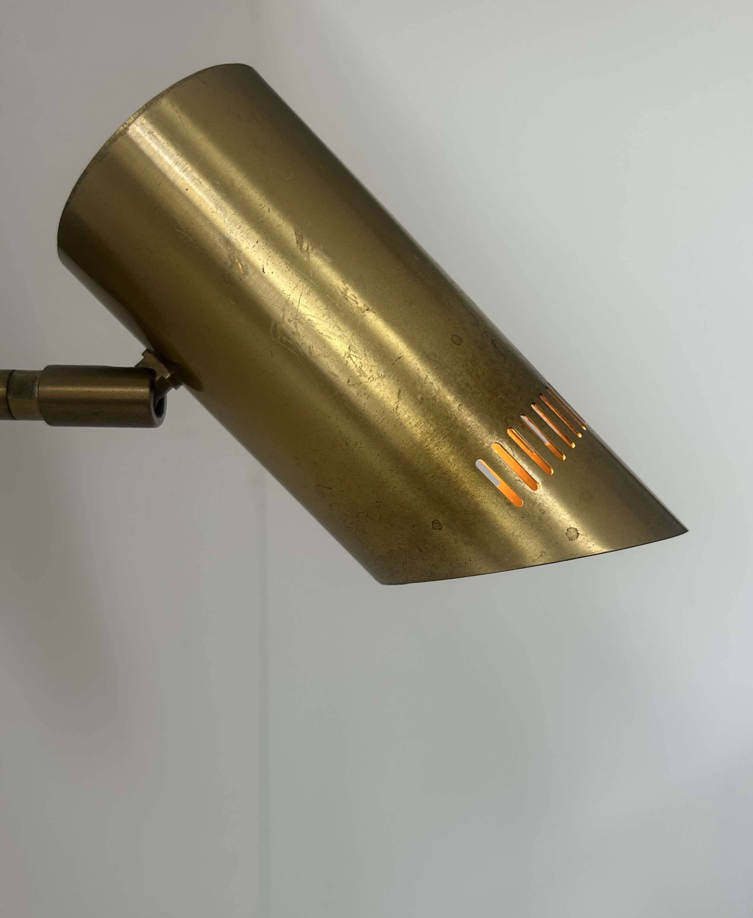 Vintage adjustable wall light, solid perforated brass, France 1960