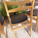5 Scandinavian style chairs, wood and black faux leather.