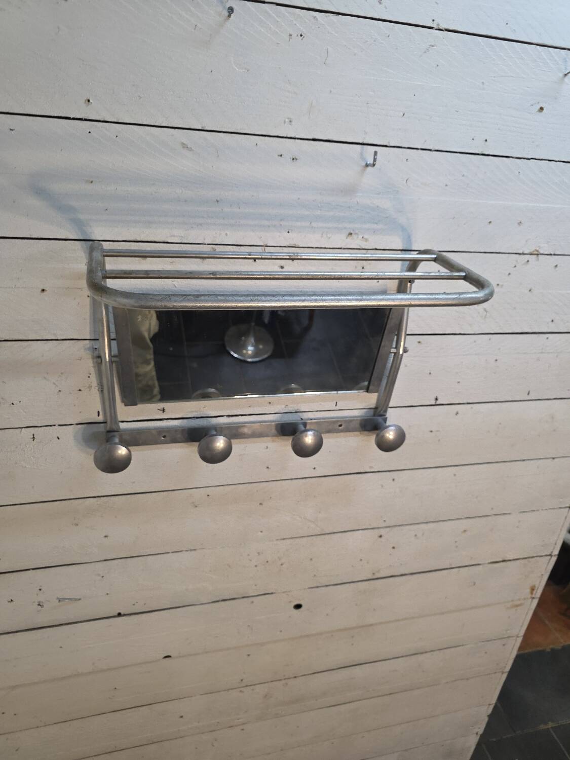 1960s swivel mirrored aluminum coat rack