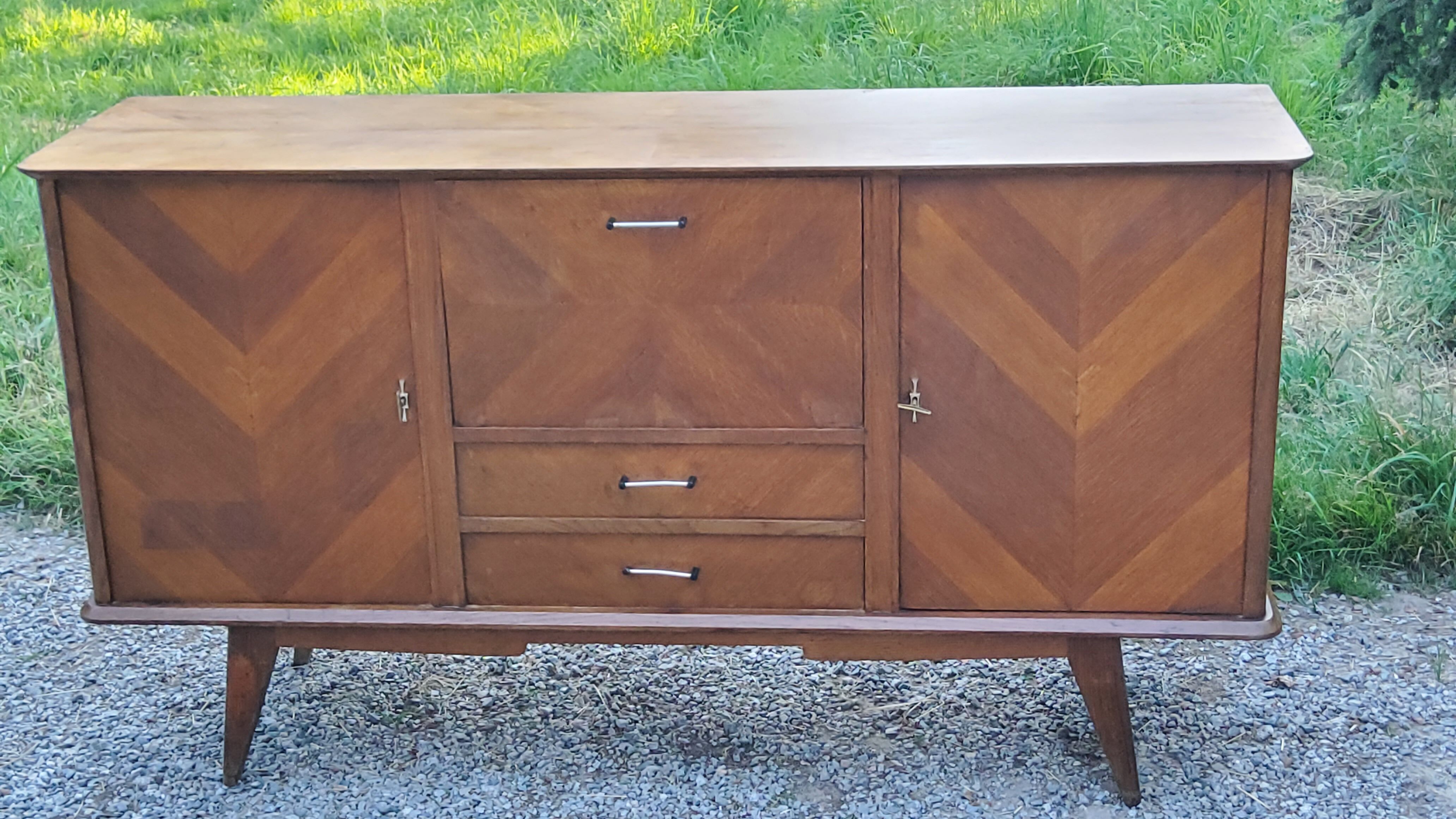 Vintage gold oak row feet compass from the 50s