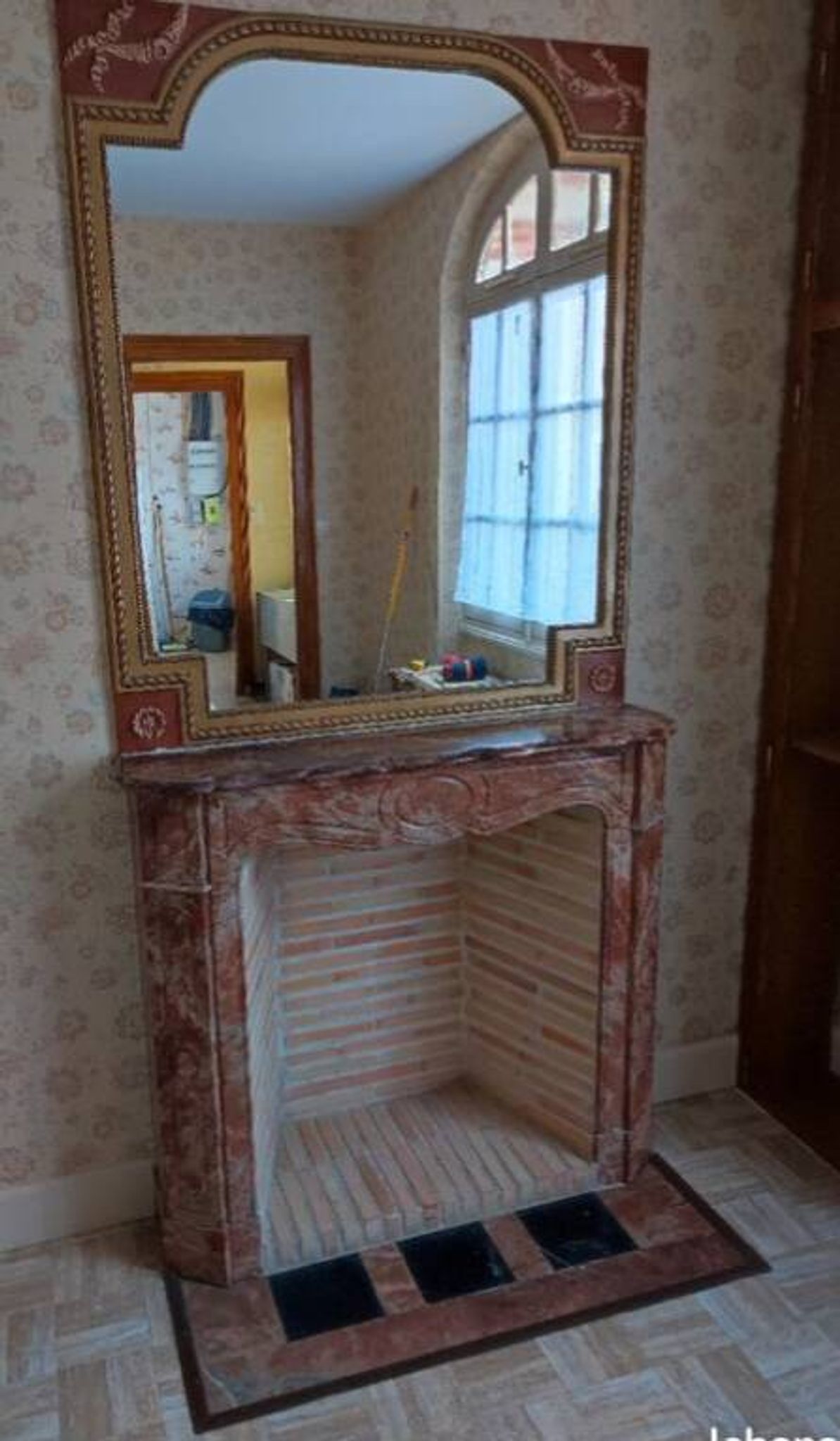 Pompadour fireplace in pink marble