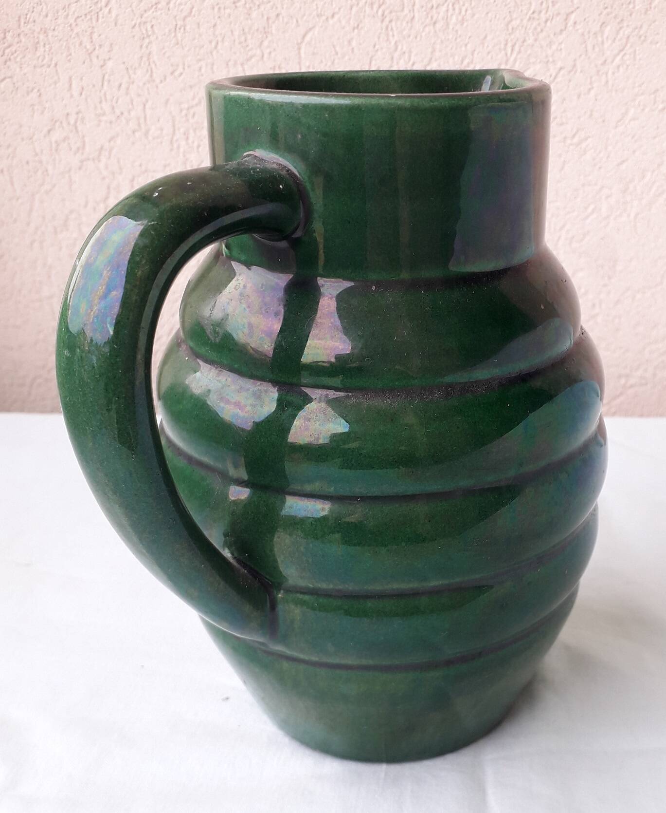 Green ceramic pitcher