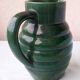 Green ceramic pitcher