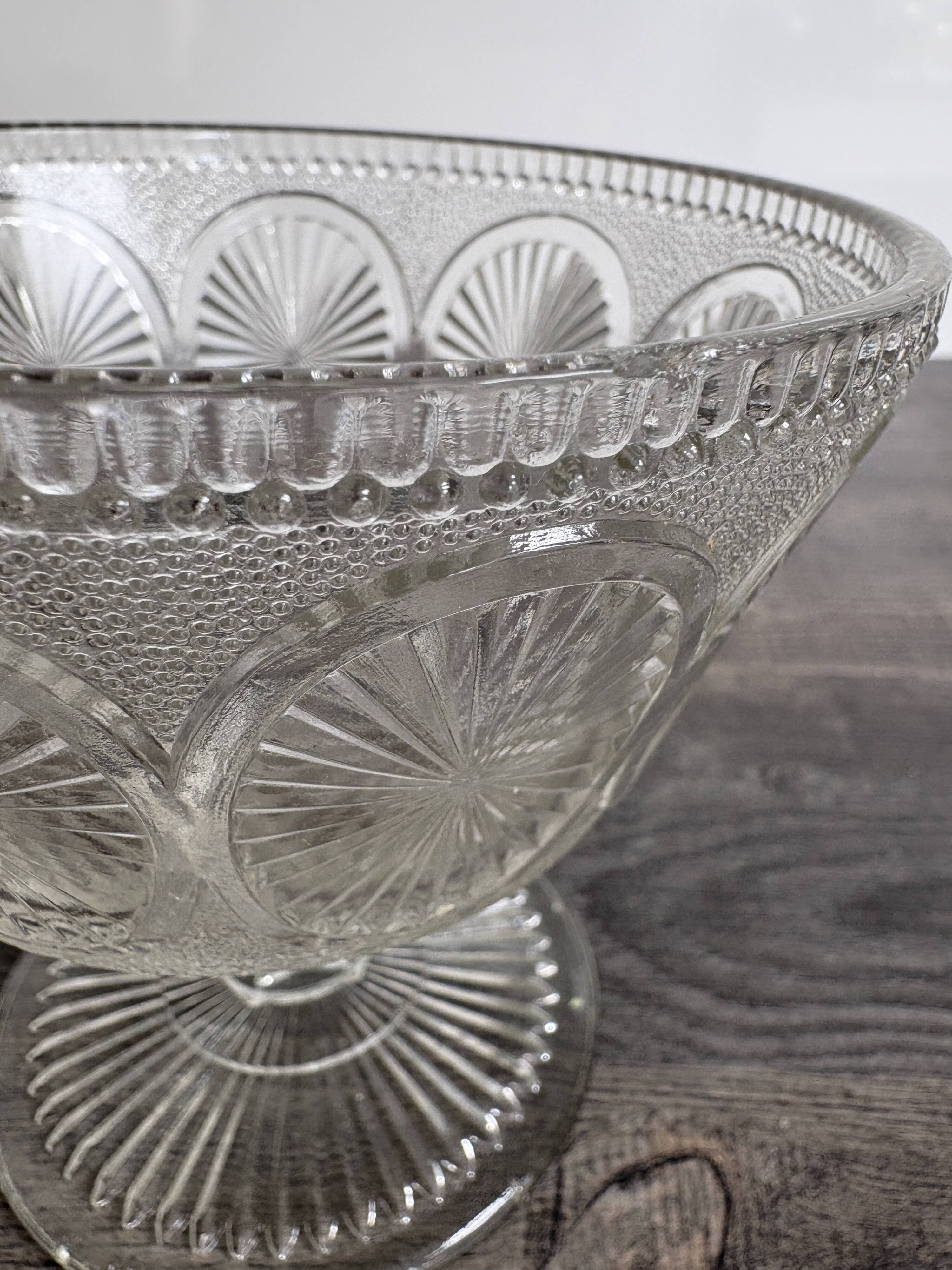 Antique glass bowl on pedestal