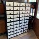 Large black and white industrial chest of drawers in pine, 40 drawers, 1950s.