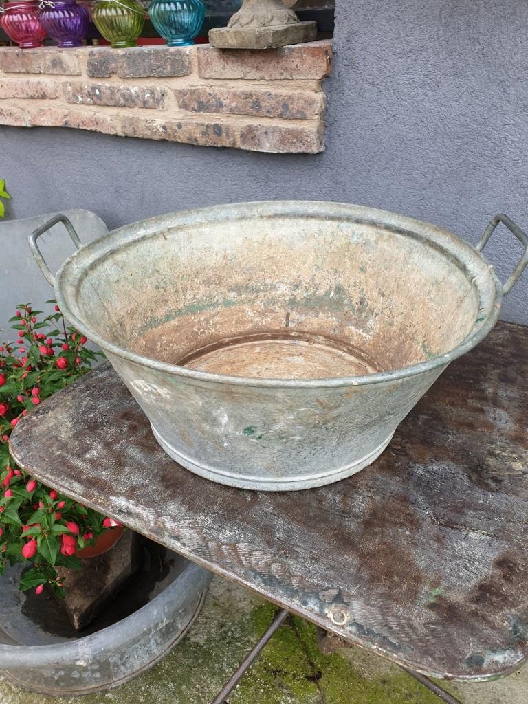 Old zinc basin with handles