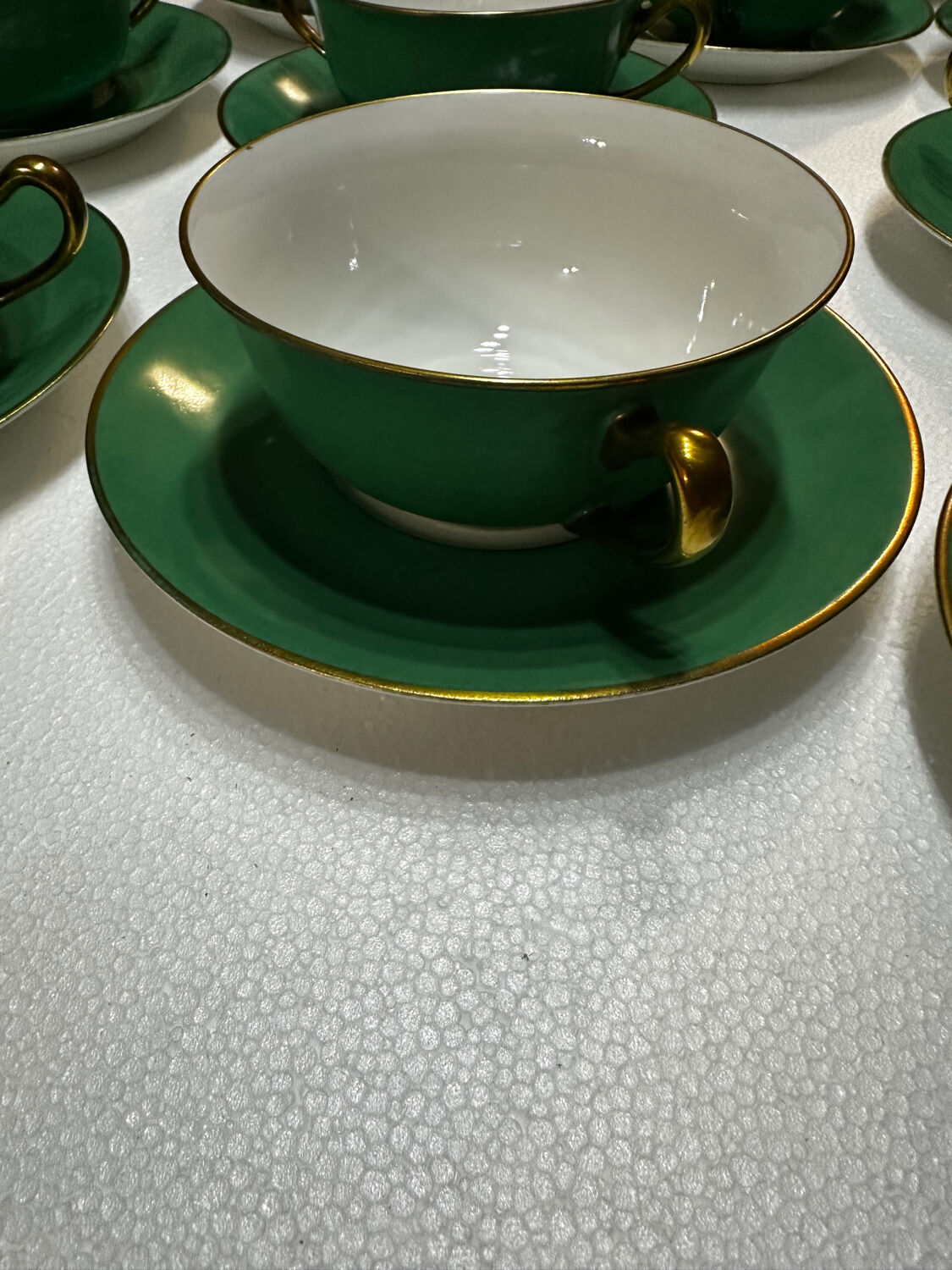 Service 14 cup and saucer in Art Deco Emerald Green and Gold.