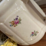 Old teapot or coffee maker in English style.