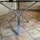 Tripod table Roche Bobois. 1970. Chrome and smoked glass.