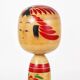 Decorative Togatta Kokeshi doll sculpture from northern Japan, hand-painted.