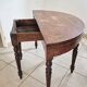Half-moon table made of solid wood.
