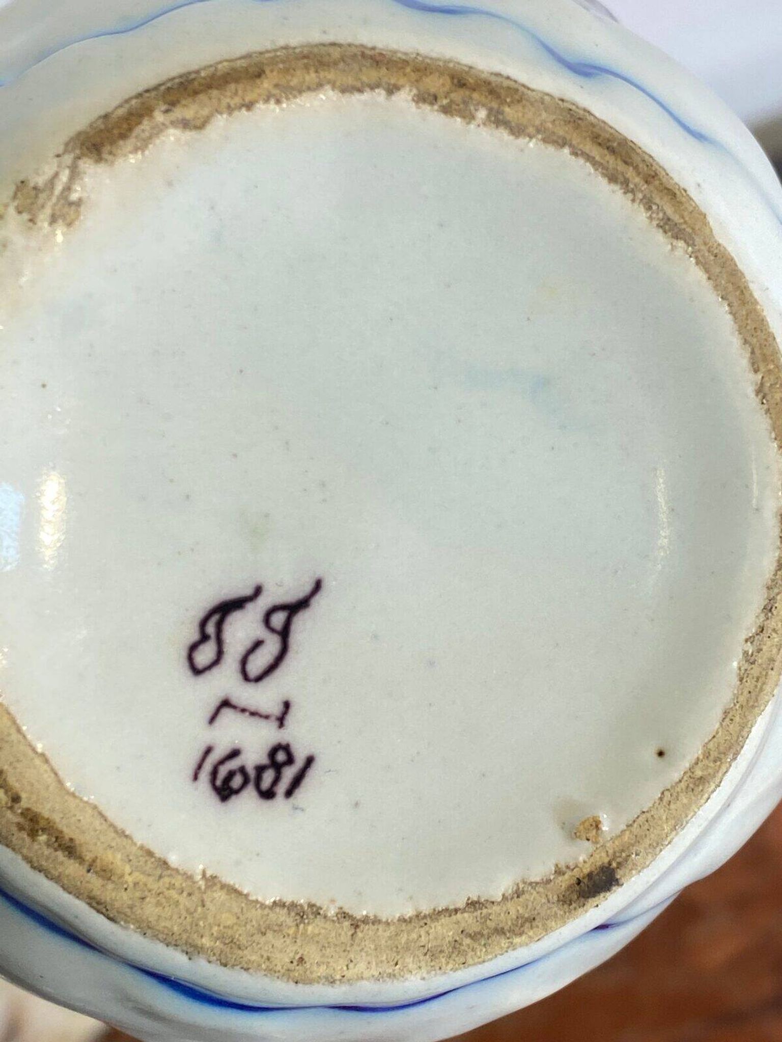 Small antique jug in faience from Les Sables d'Olonne, hand-painted.