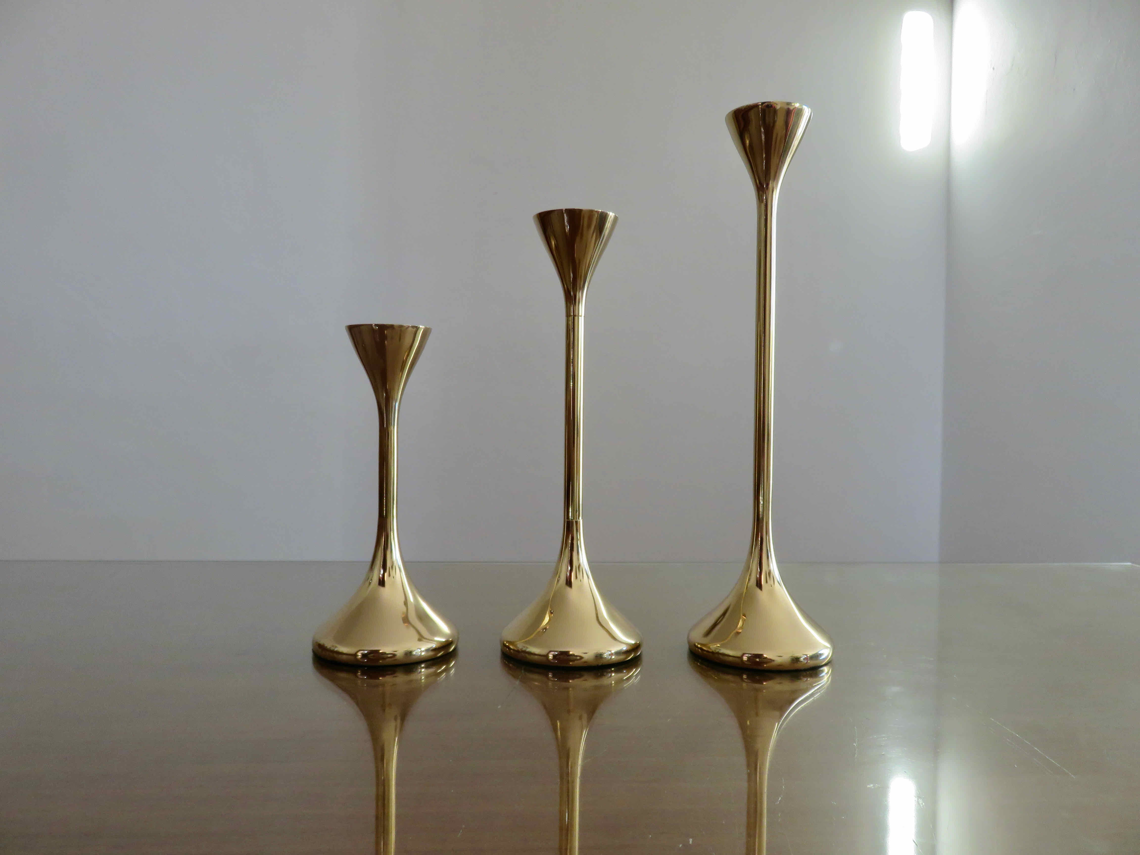 Series of 3 Scandinavian brass candle holders, 70s tulip foot
