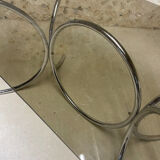 Smoked glass oval table from the 1970s.