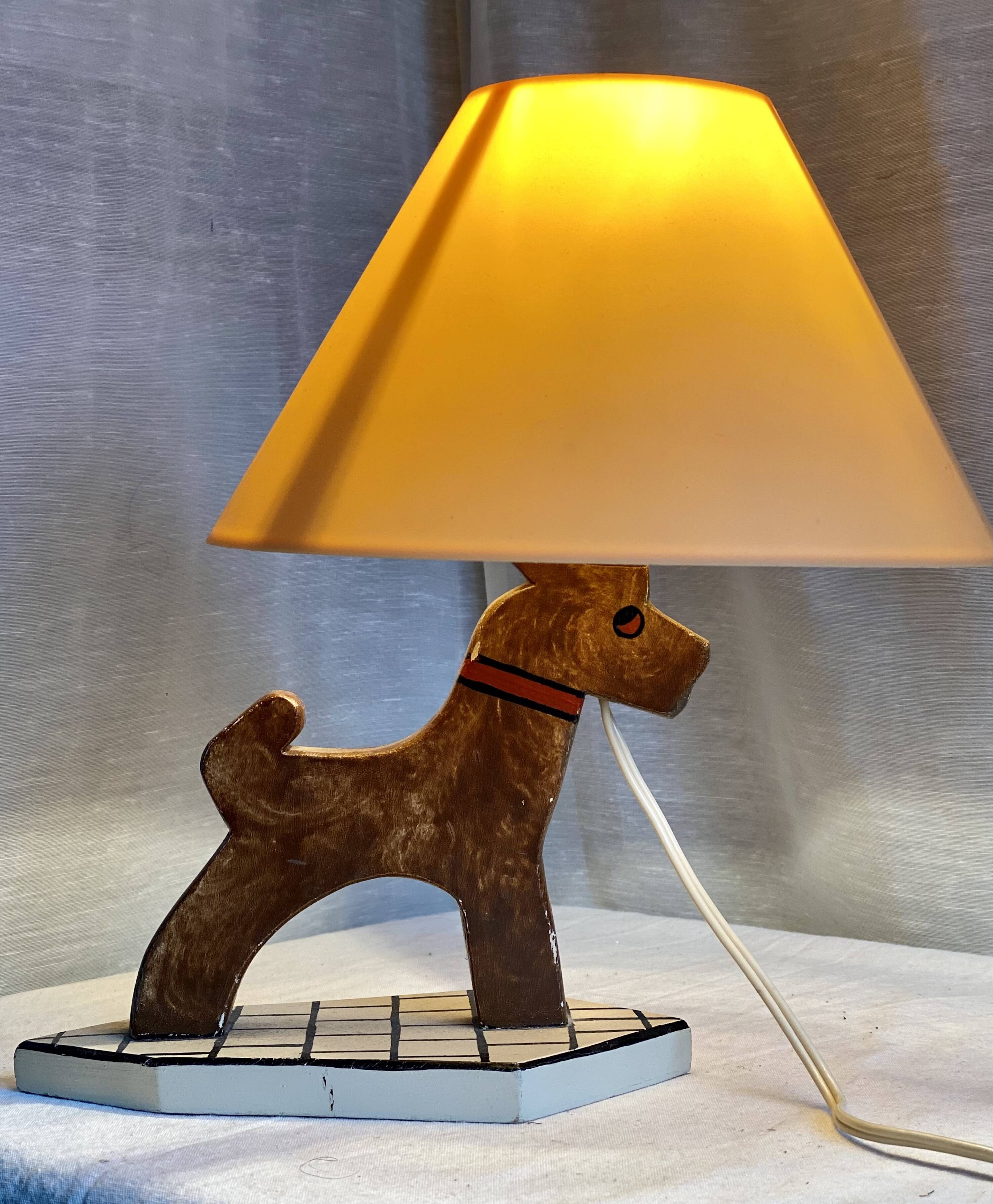 Vintage 1970s polychrome wooden lamp in the shape of a dog.