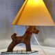 Vintage 1970s polychrome wooden lamp in the shape of a dog.