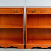 Pair of light walnut bookshelves with inlays and adjustable shelves.