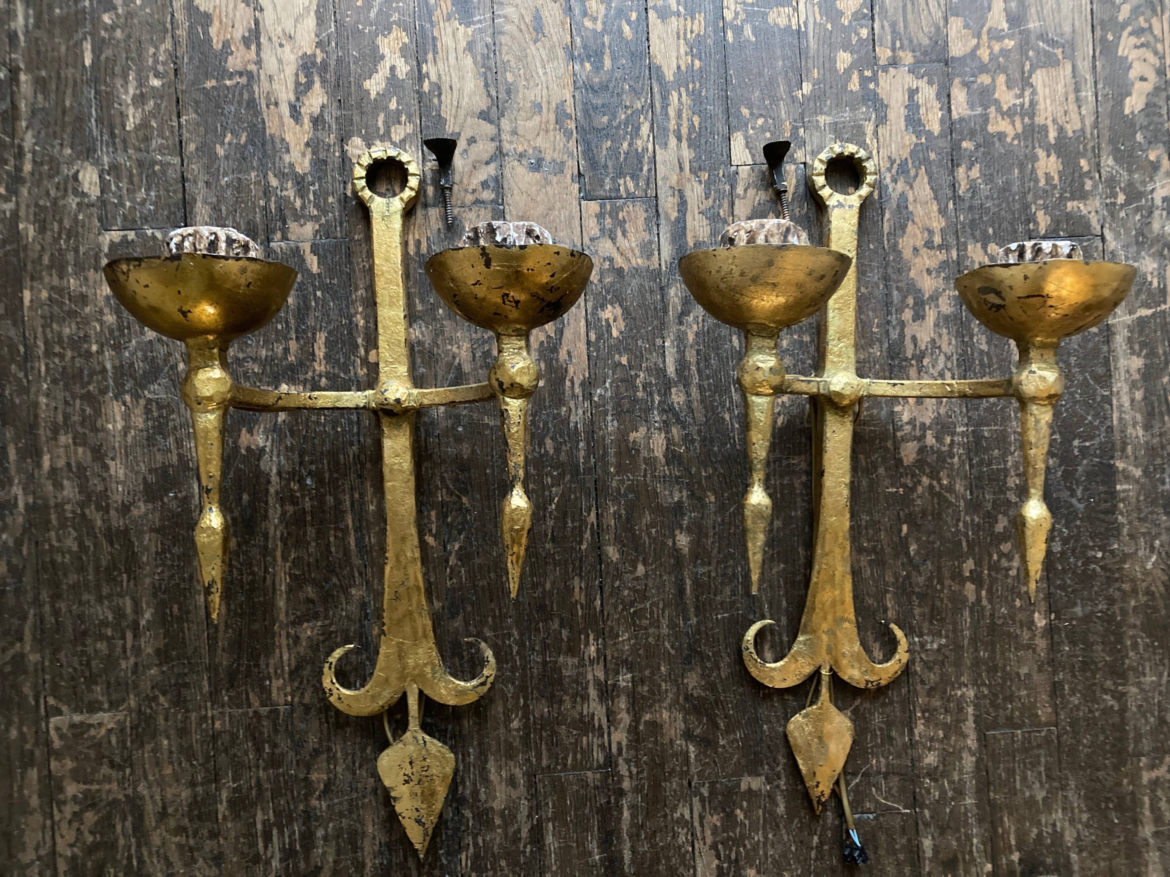 Pair of XXL torchlight sconces in golden beaten iron Italian work 1960