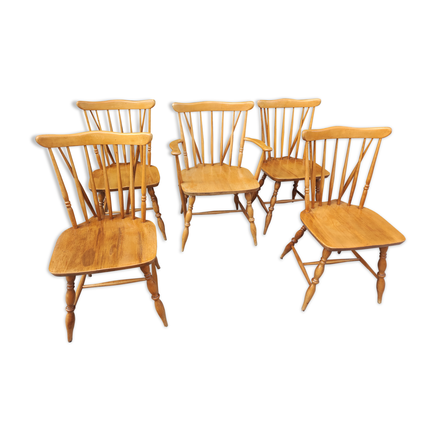 Four chairs and a Heywood Wakefield Windsor armchair. Vintage
