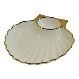 Shell-shaped porcelain pocket bowl from Queen’s Porcelain, with a gold rim.