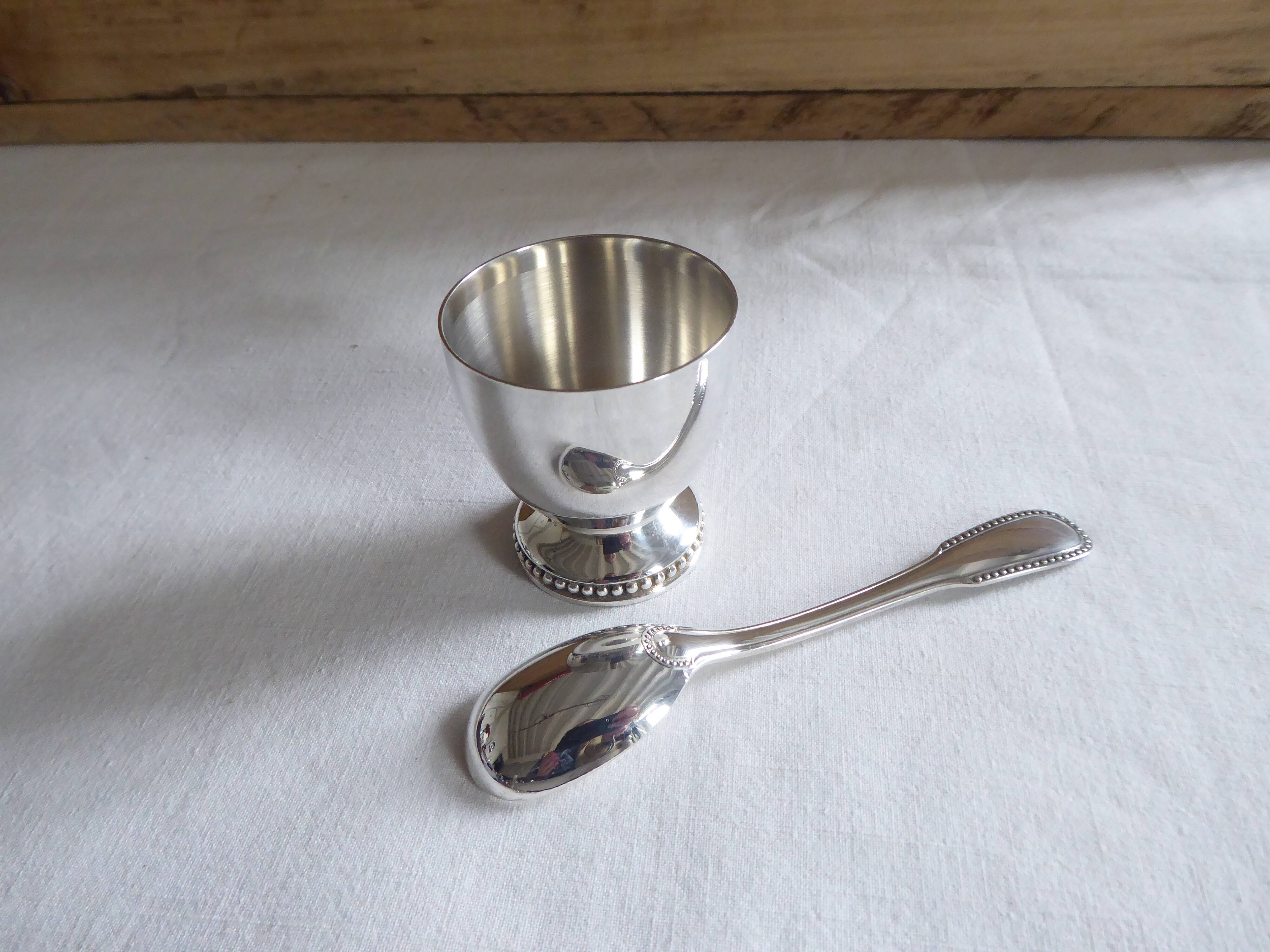 Cockerel + silver metal spoon