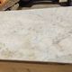 Old chest of drawers with white marble.