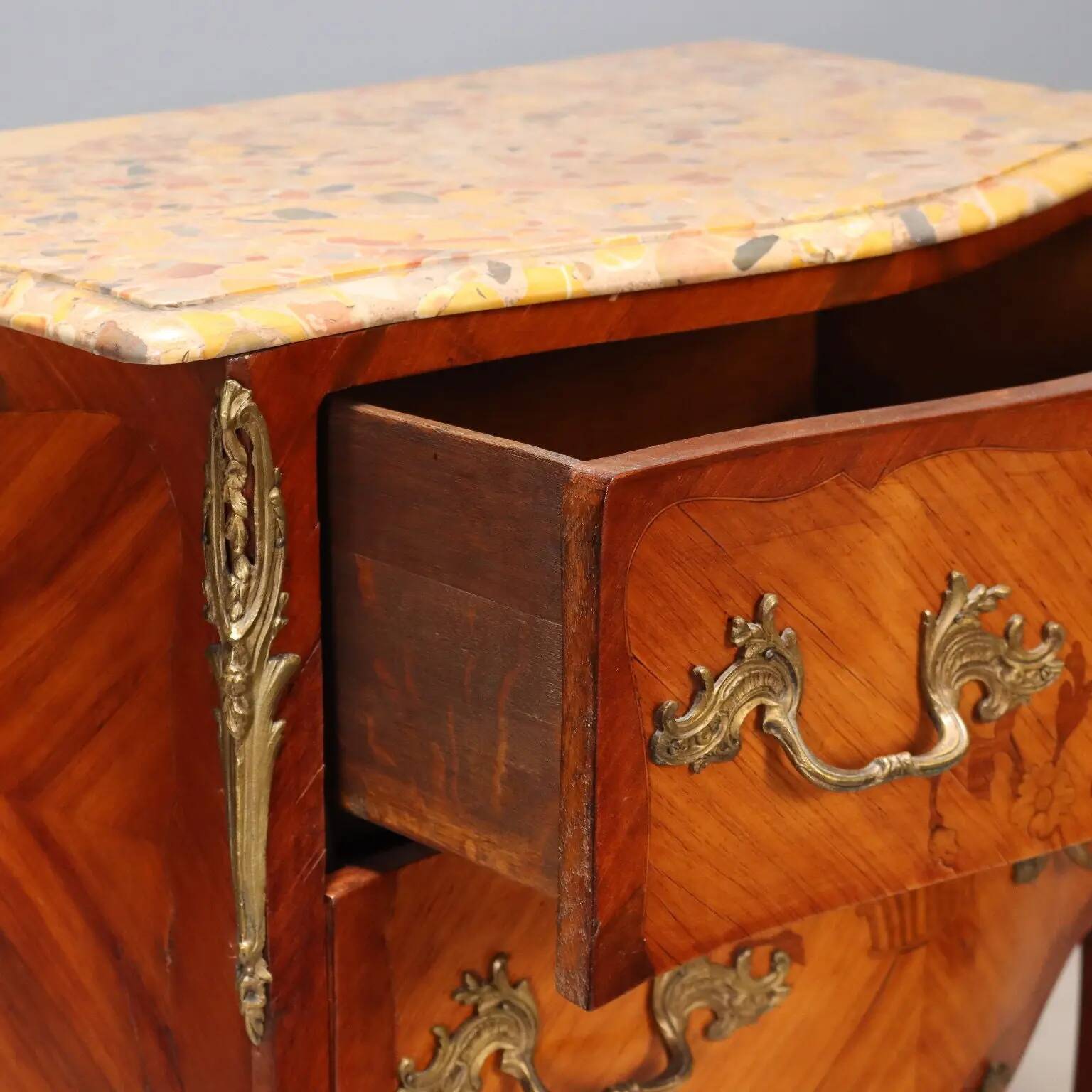 Antique commode in Baroque style made of mahogany, 20th century.