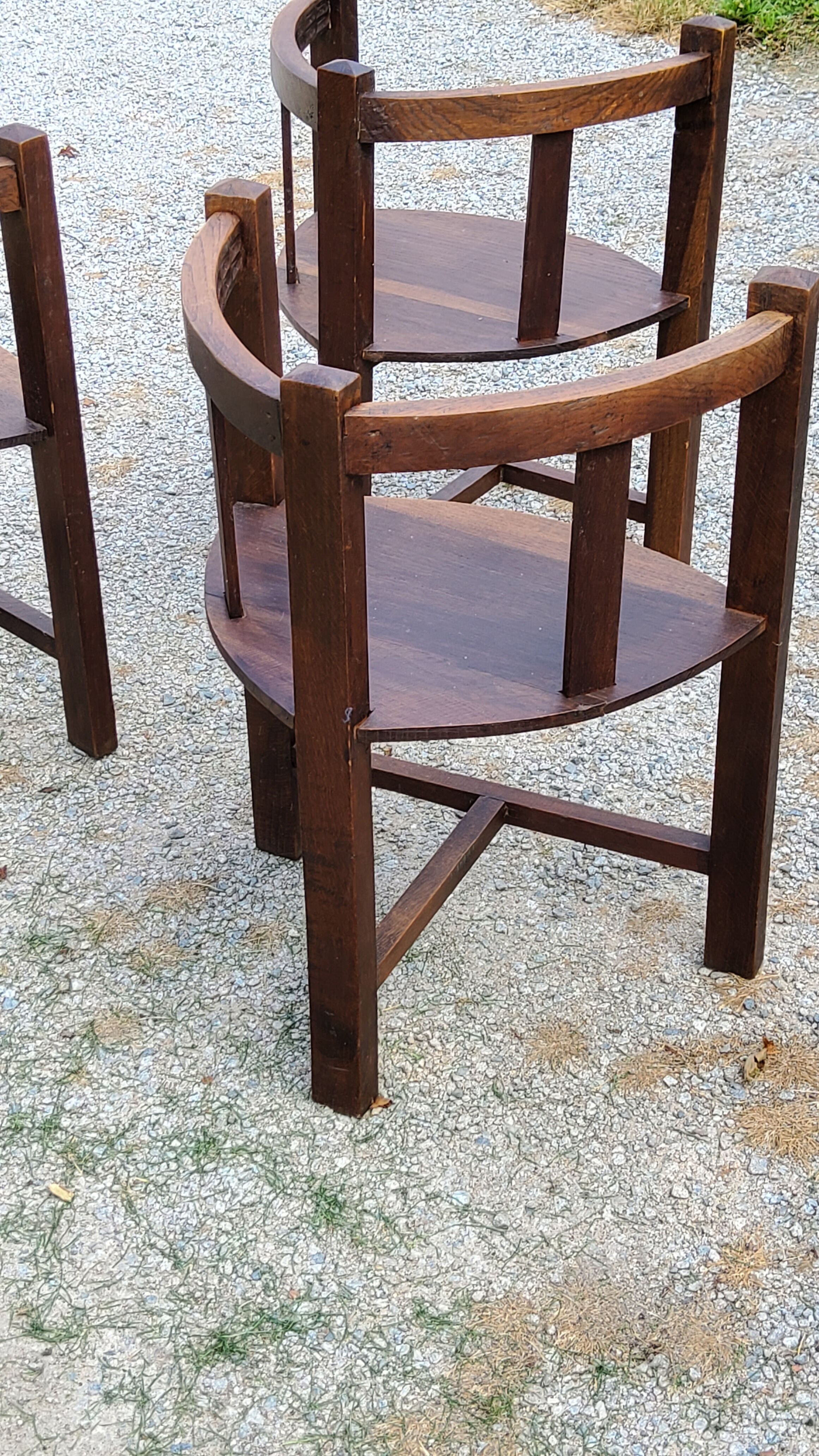Set of three brutalist tripod armchairs in carved solid oak