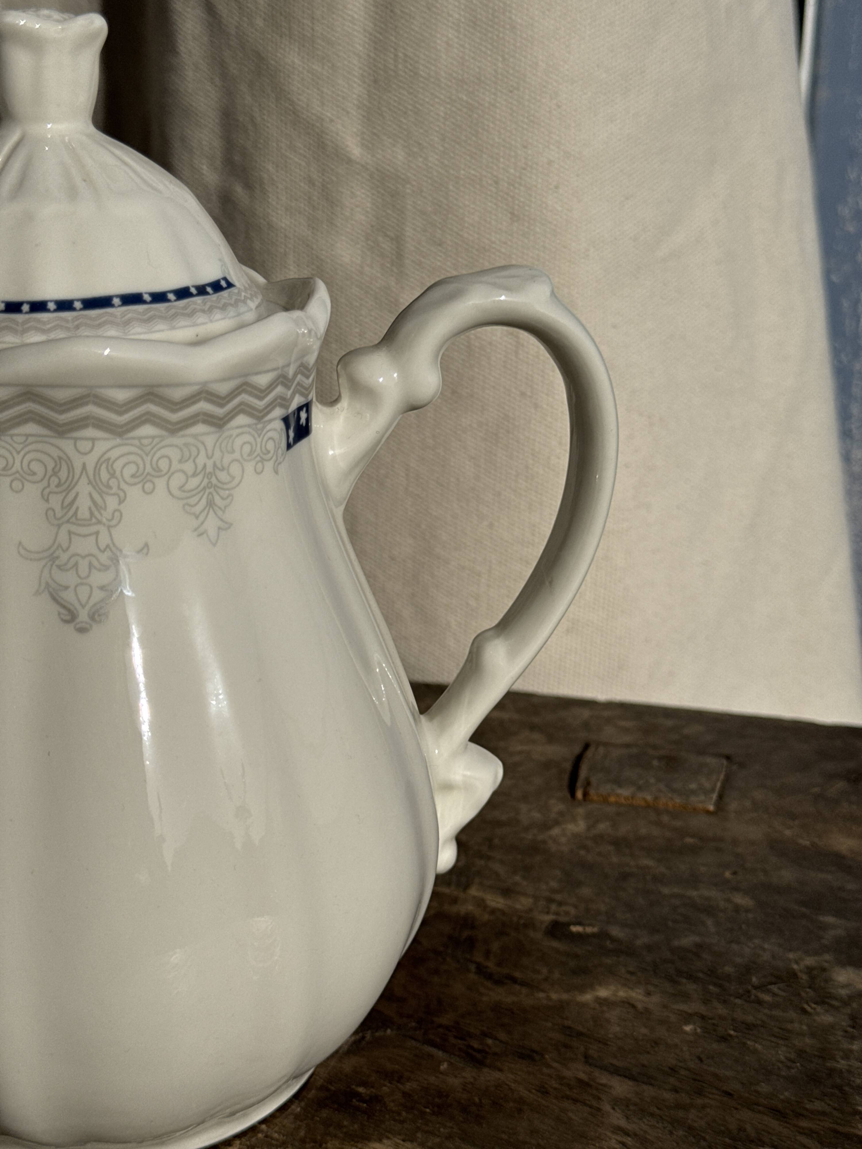 White earthenware teapot with blue and silver trim H22.5