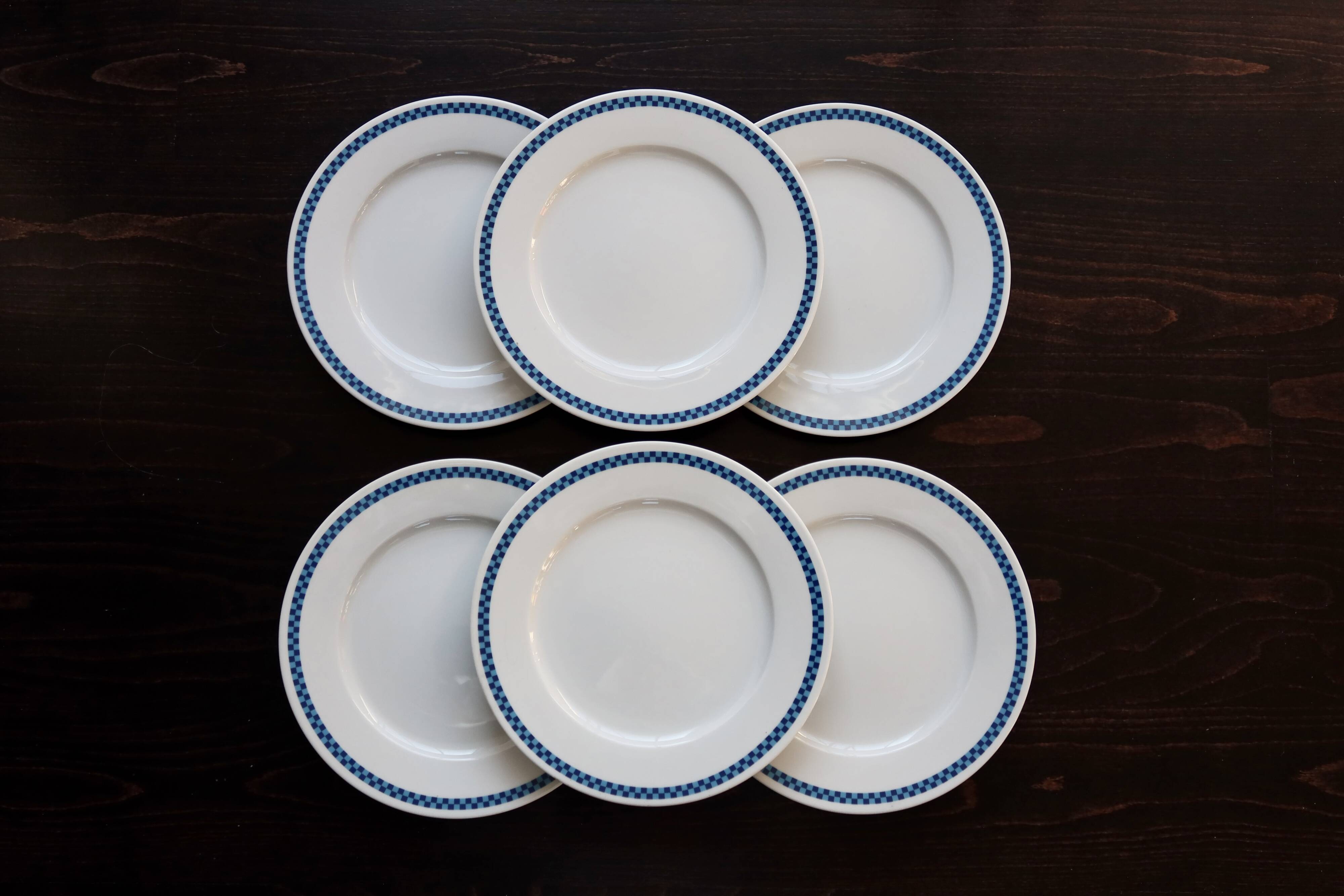 6 vintage Lustucru porcelain plates with a blue checkerboard pattern