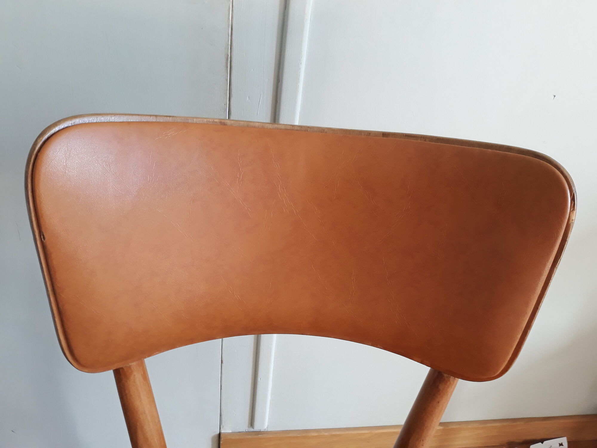 Bistro chair Baumann 1963 curved wood and skaï imitation leather caramel