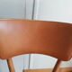 Bistro chair Baumann 1963 curved wood and skaï imitation leather caramel