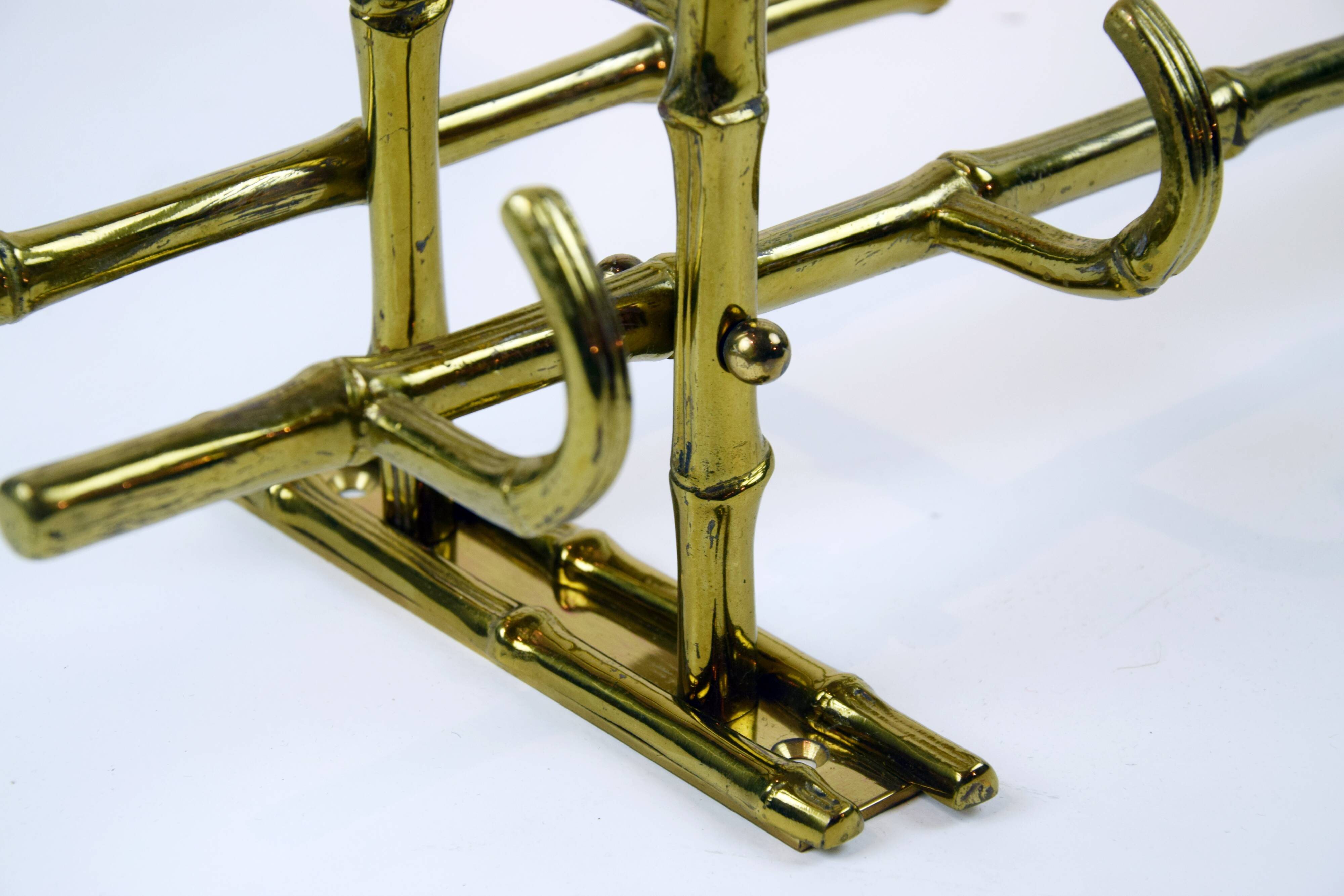 Bamboo-like coat rack in bronze
