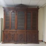 Glass-fronted walnut bookcase