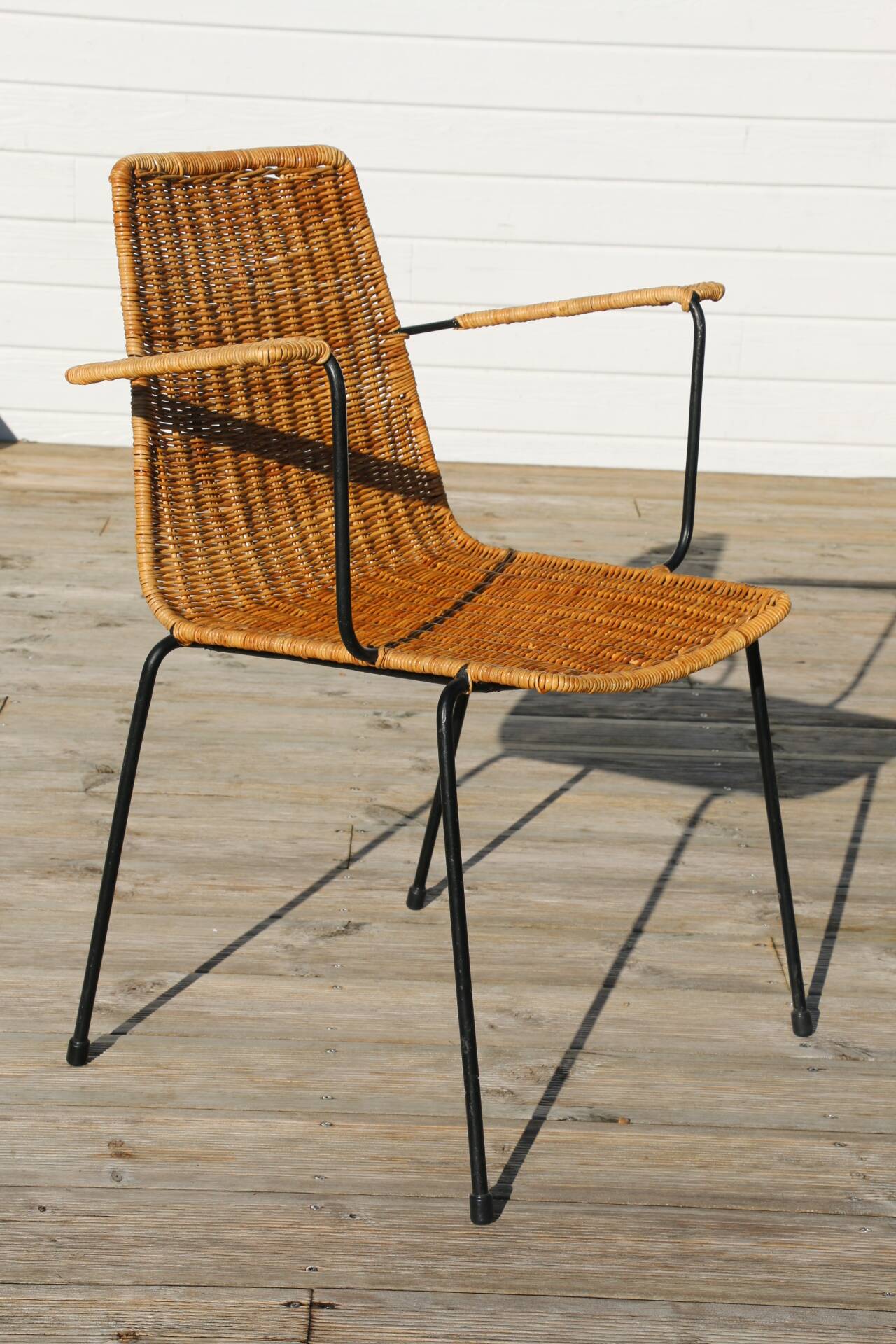 Rattan and steel armchair