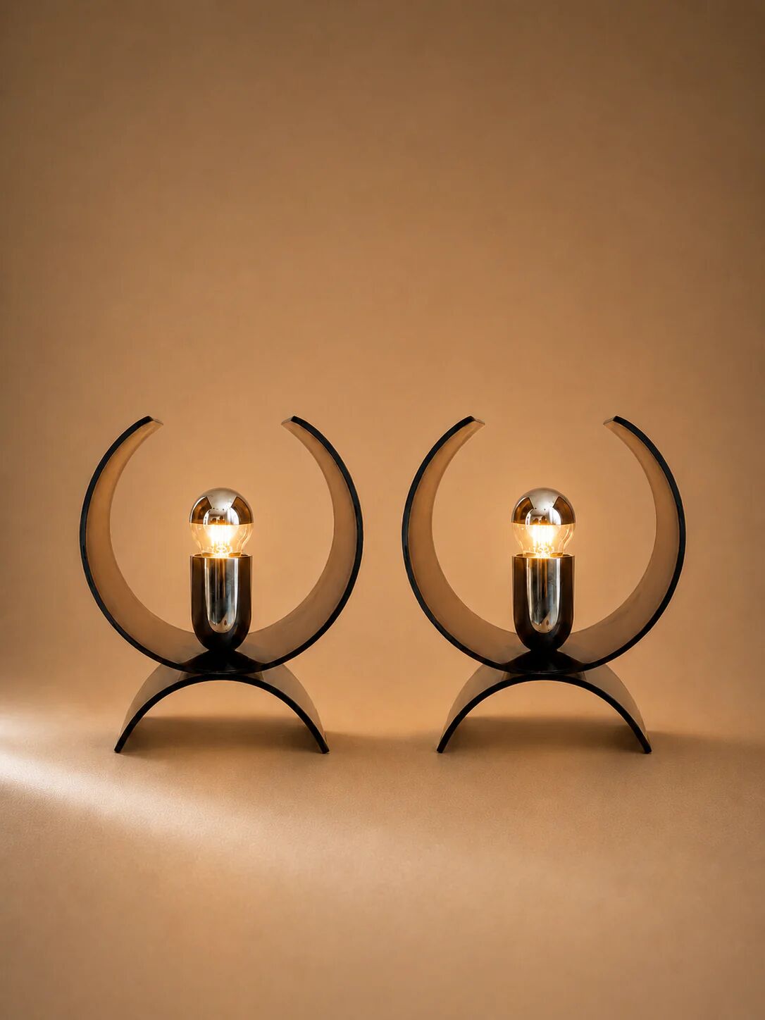 Pair of smoked brown plexiglass lamps from the 1970s.