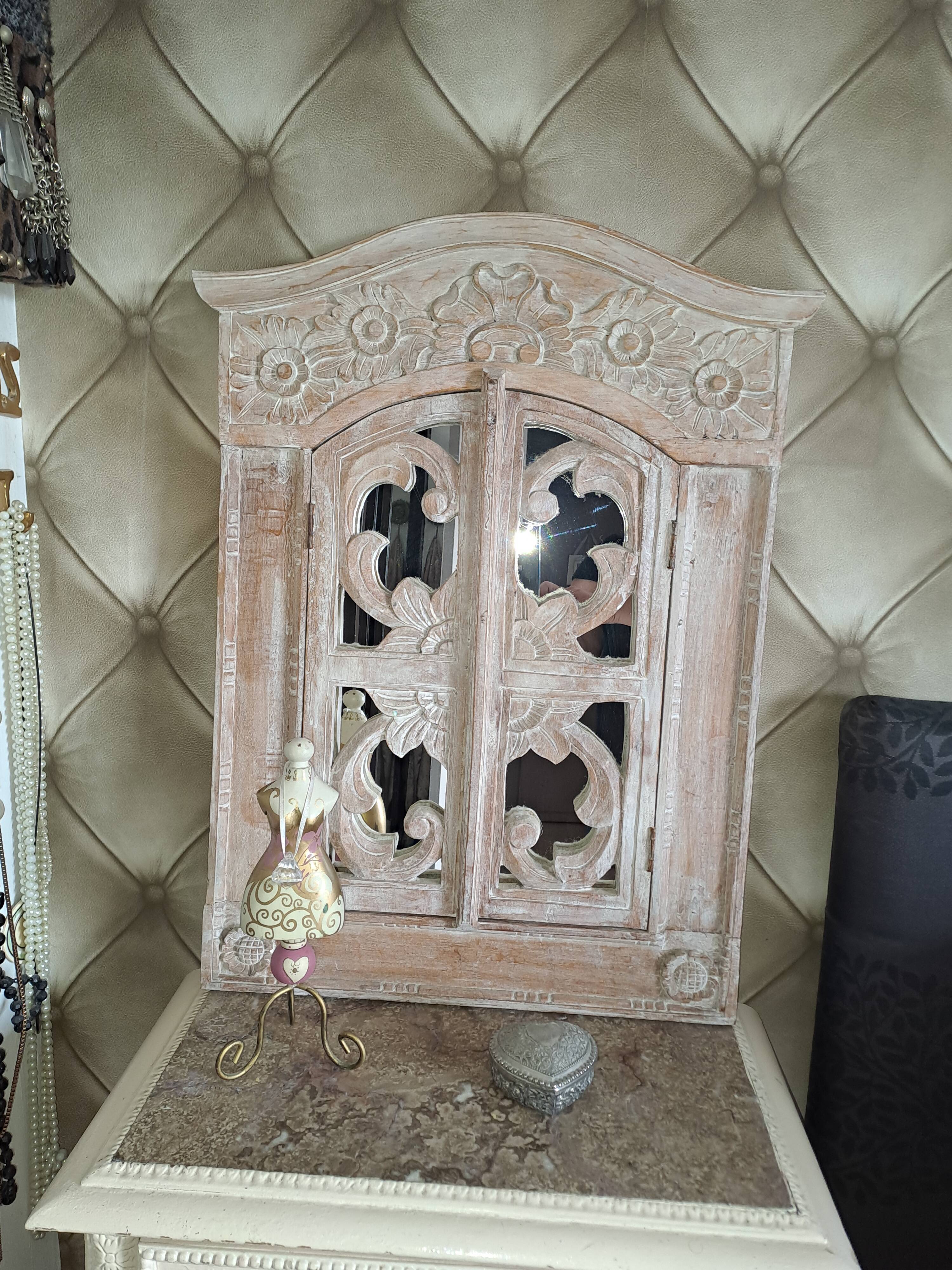 Carved white wood mirror 1990 decorative carved with opening shutters on a square mirror