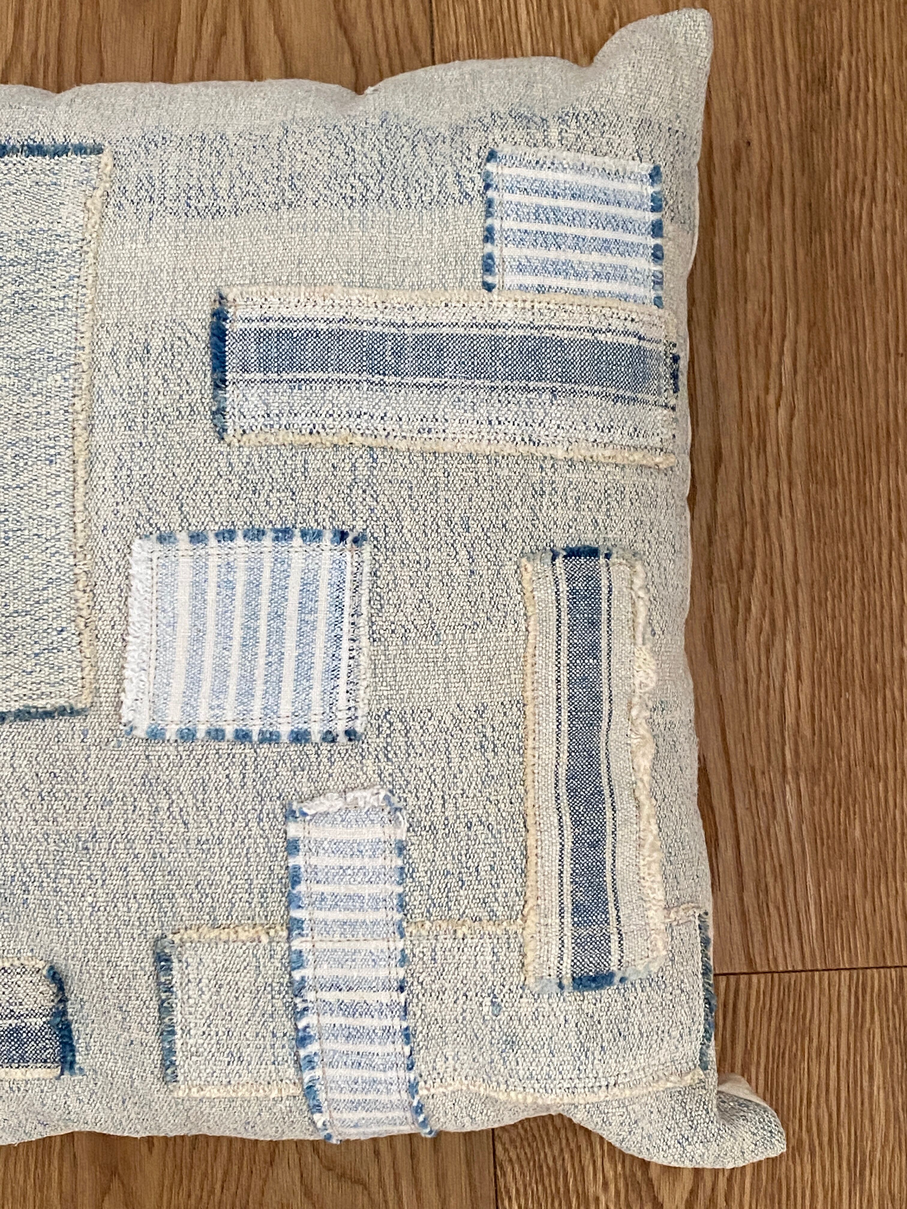 Old canvas cushion woven kilim style, patched