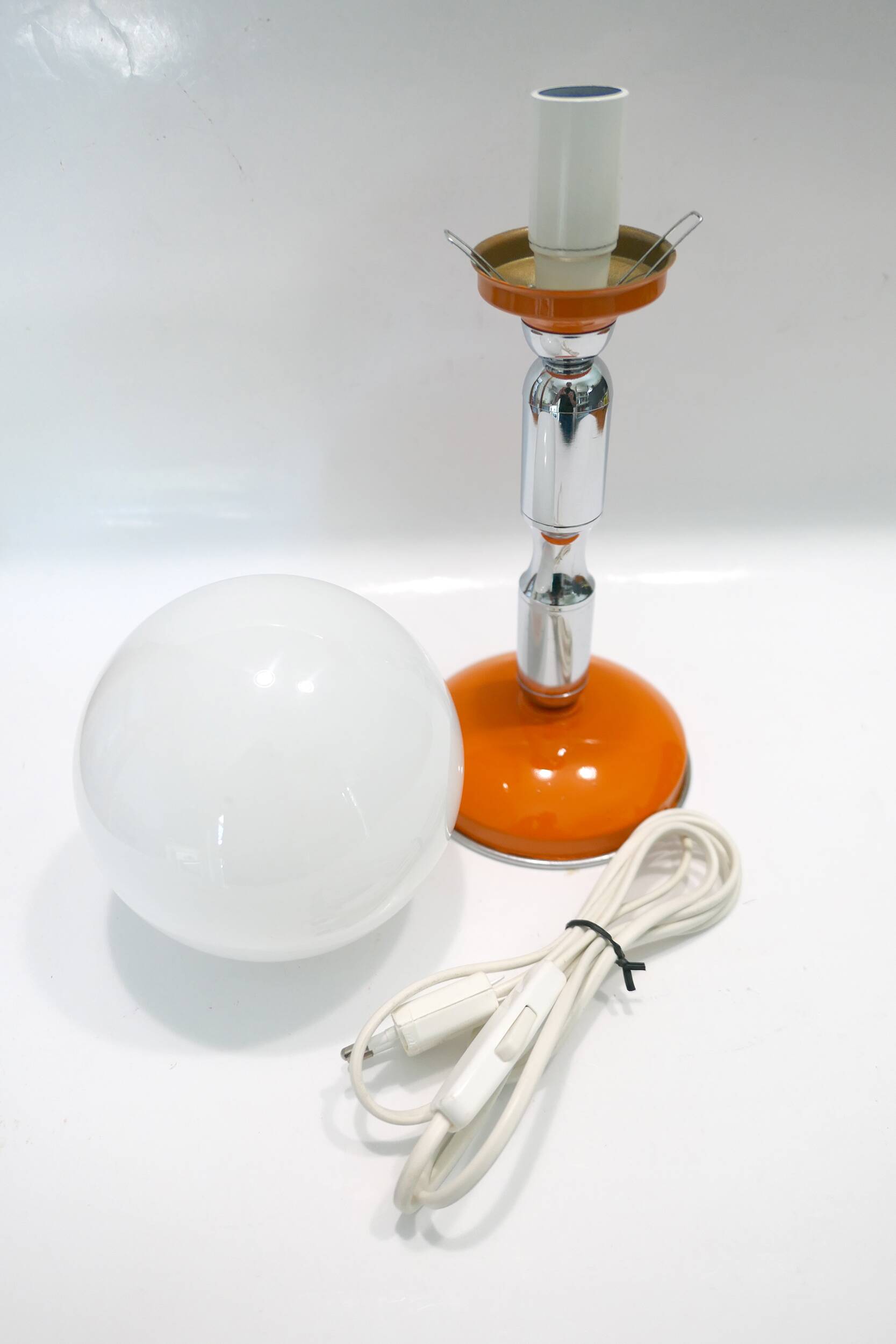 1970s chrome and orange table lamp design