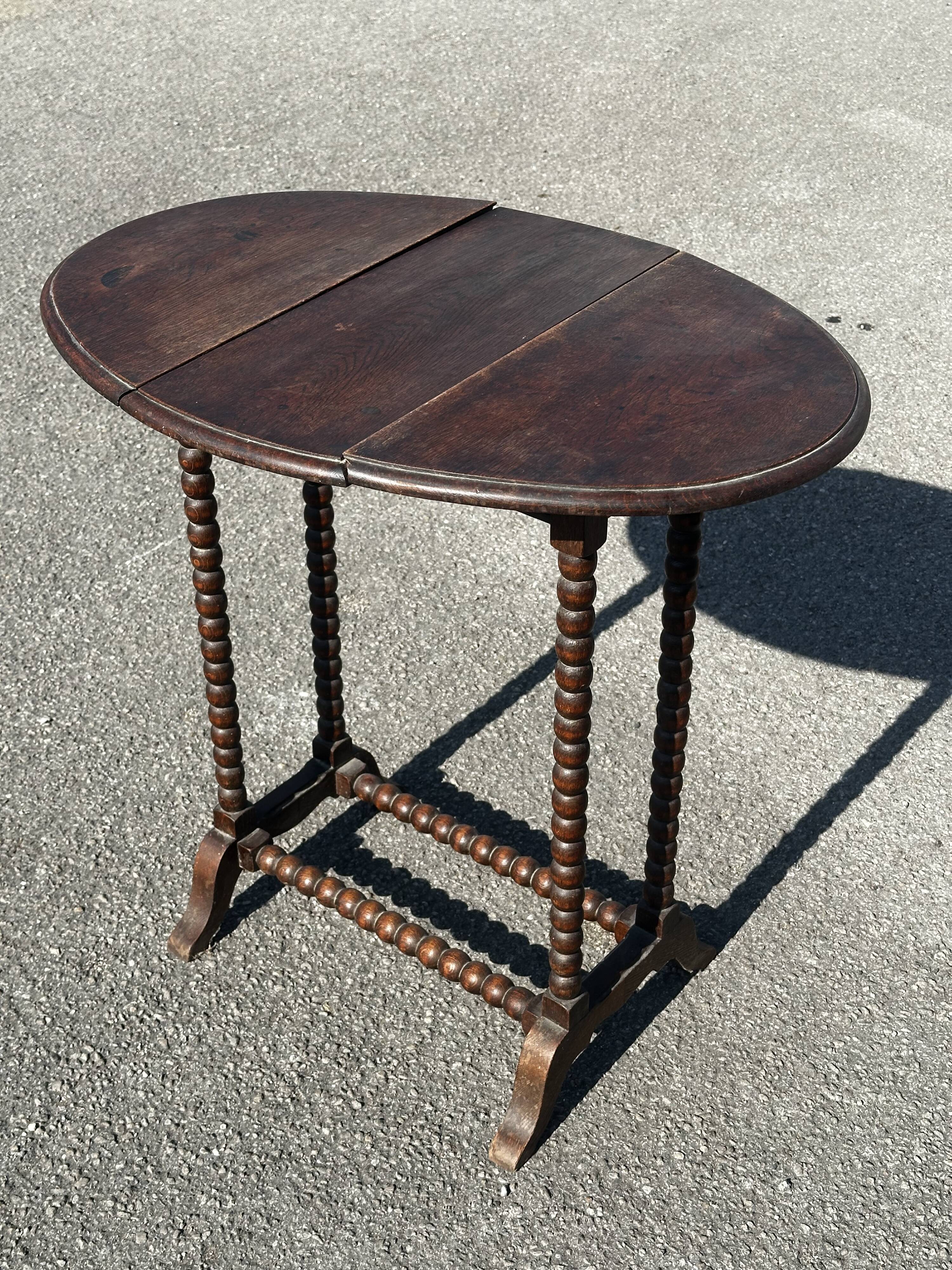 Small folding table called Gateleg, Victorian era